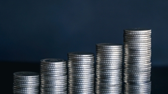 stack-of-money-coin-on-black-background-business-2023-03-23-23-14-04-utc