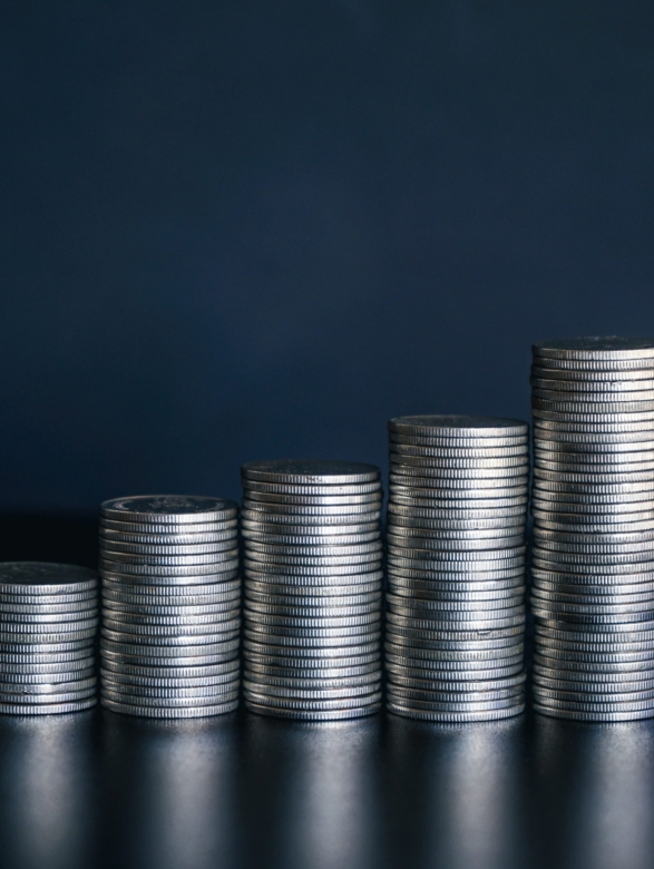 stack-of-money-coin-on-black-background-business-2023-03-23-23-14-04-utc